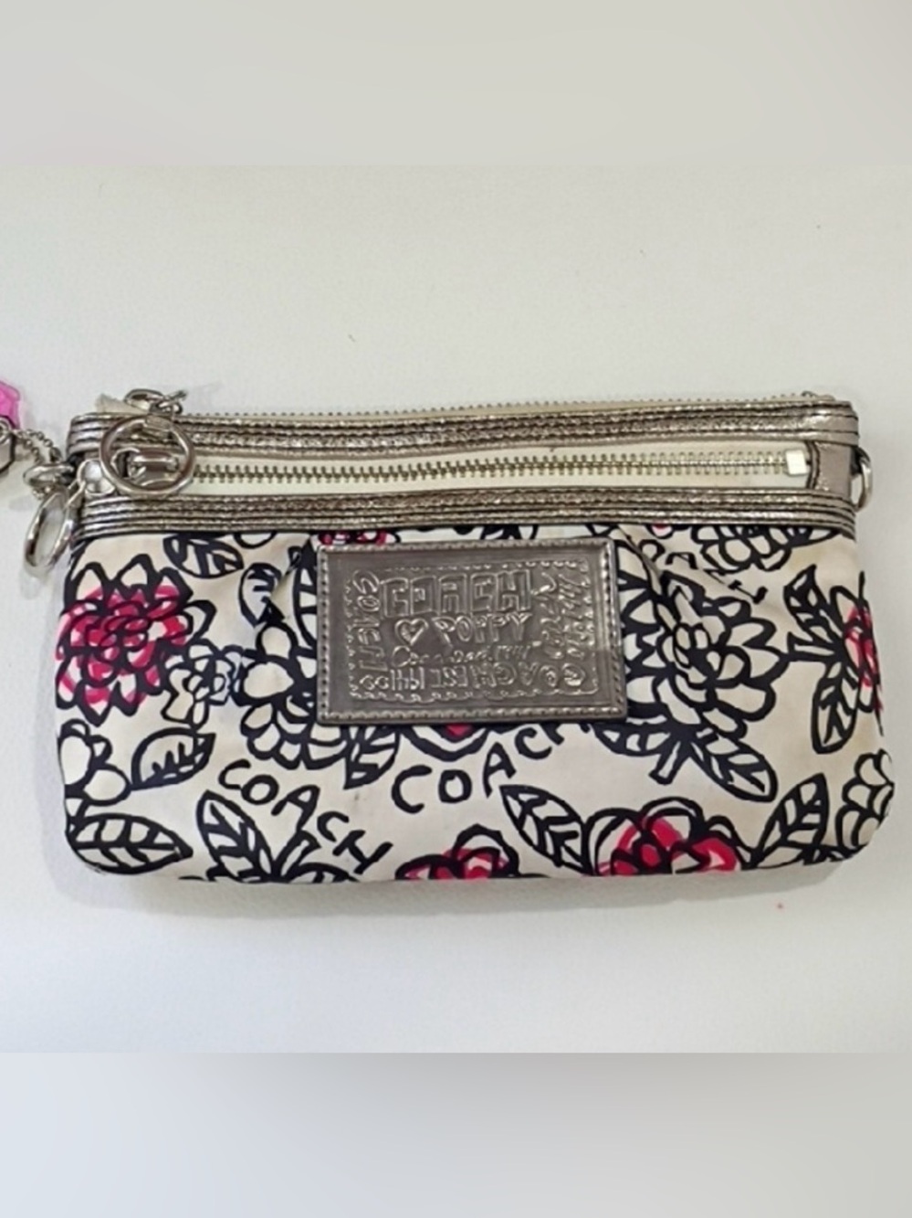 **Coach Poppy Floral Wristlet Pouch in White, Pink and Black